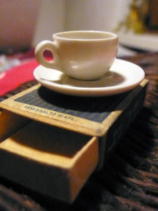 Tiny cup and saucer by Soili Arha